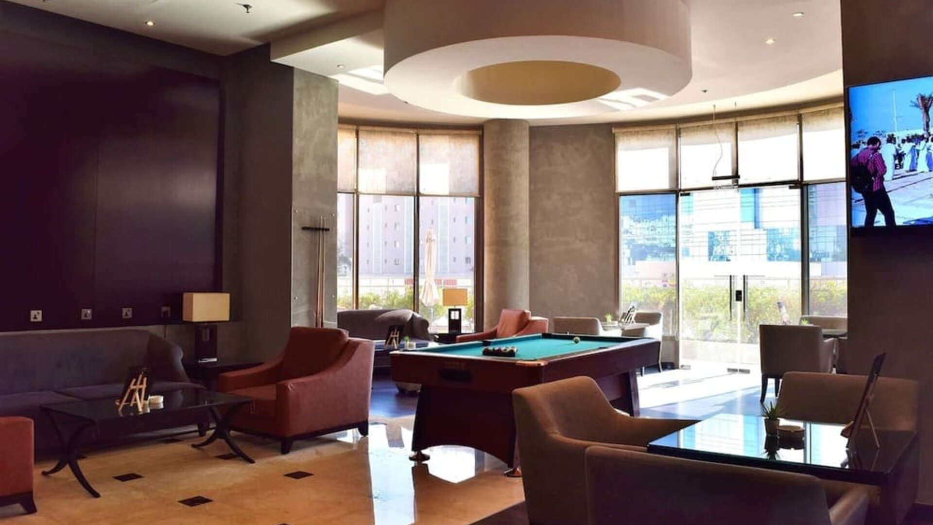 Lounge and coworking space at Millennium Central Doha.