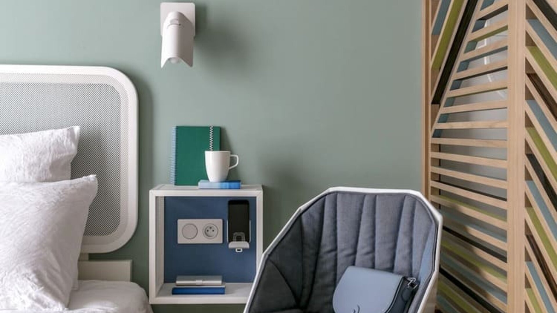 Day rooms with plush bedding at OKKO Hotels Nice Aéroport.