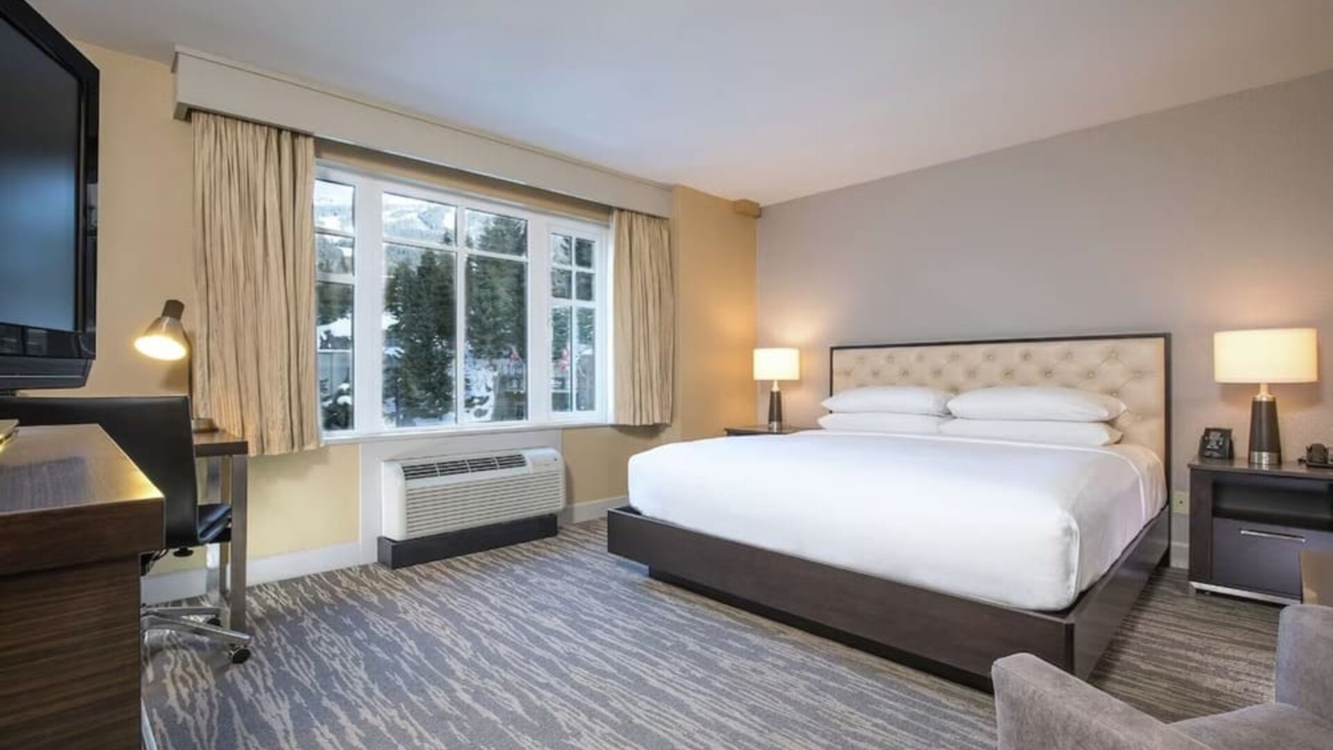 King room with TV at Hilton Whistler Resort & Spa.