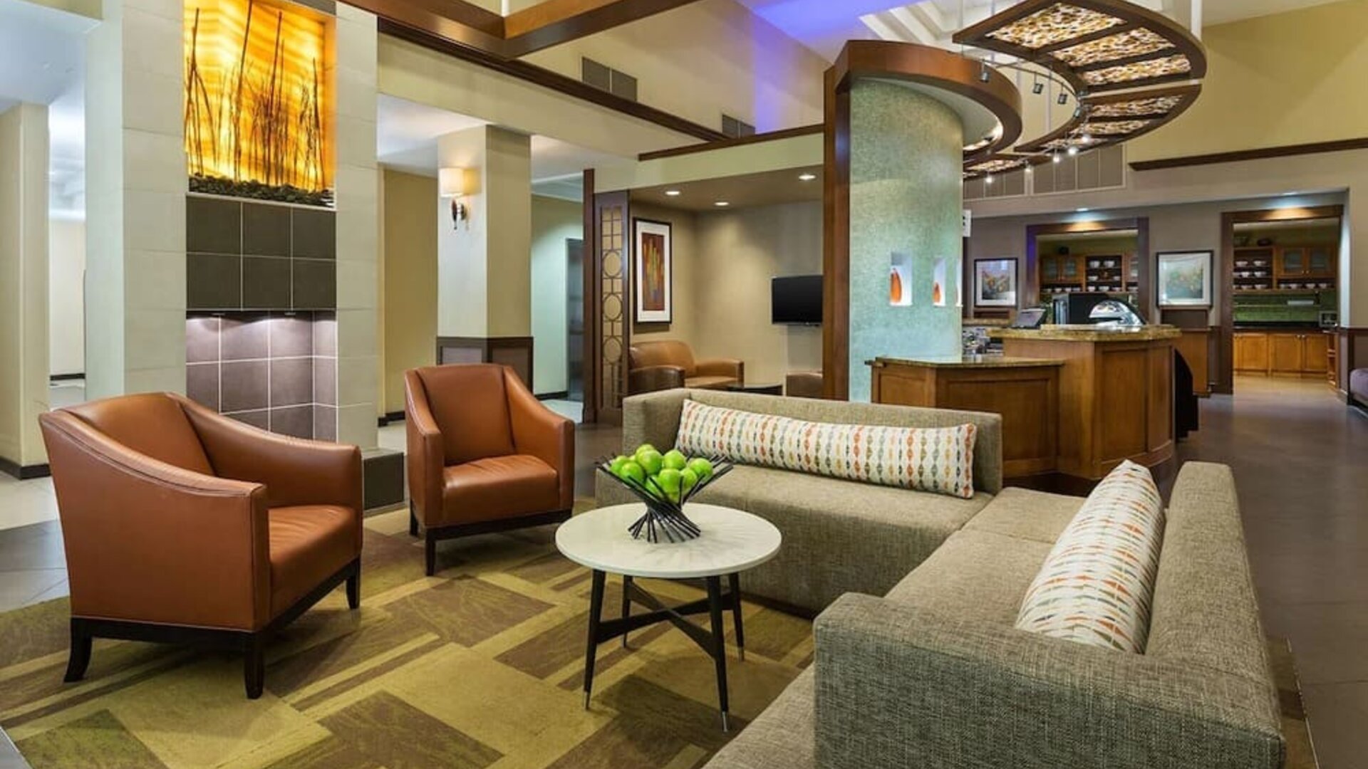 Lobby and coworking lounge at Hyatt Place Fort Lauderdale Cruise Port.