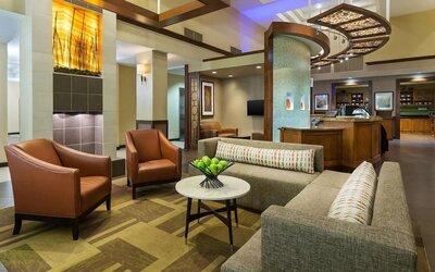 Lobby and coworking lounge at Hyatt Place Fort Lauderdale Cruise Port.
