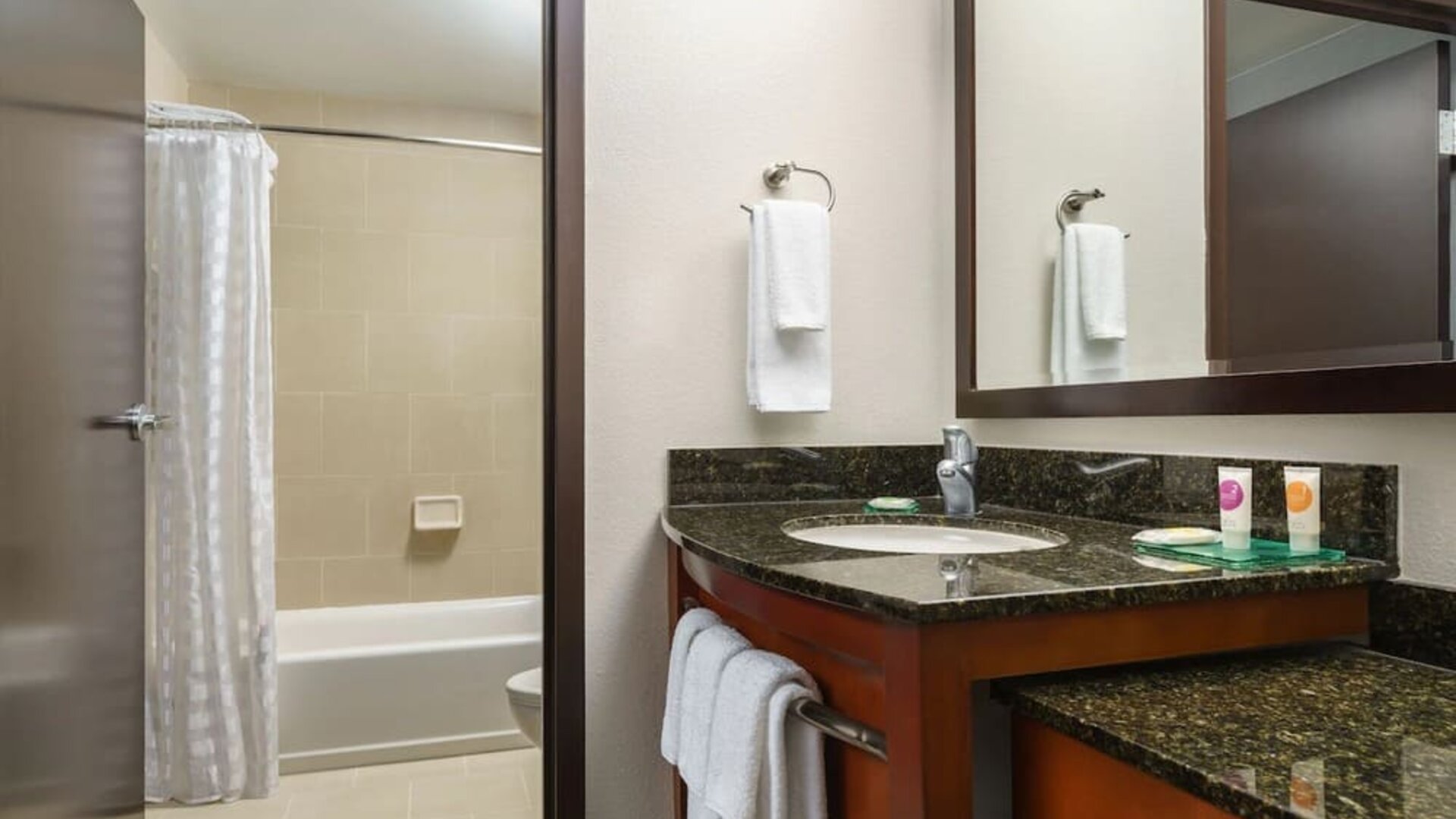 Guest bathroom with shower and tub at Hyatt PLACE Fort Lauderdale Airport - South & Cruise Port.
