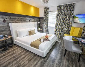 Delux king room with work desk at Catalina Hotel & Beach Club.