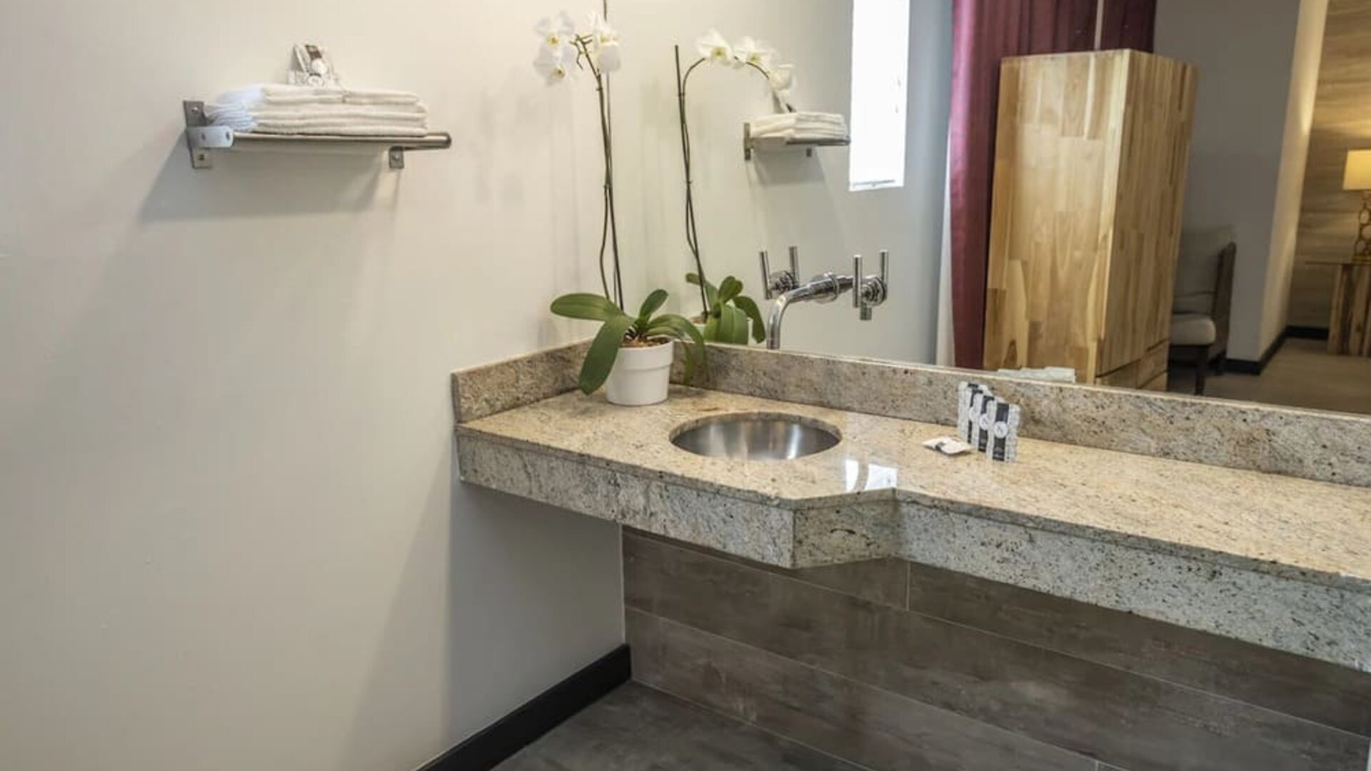 Guest bathroom with shower at Catalina Hotel & Beach Club.
