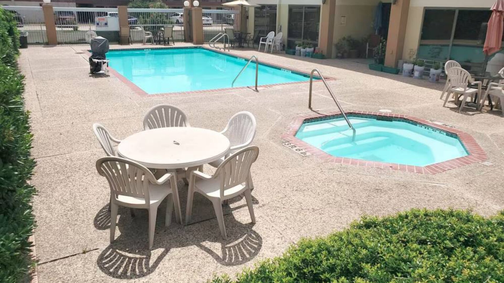 Refreshing outdoor pool at Coratel Inn & Suites By Jasper New Braunfels IH-35 EXT 189.