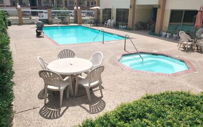 Refreshing outdoor pool at Coratel Inn & Suites By Jasper New Braunfels IH-35 EXT 189.
