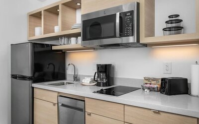 In-room kitchen at TownePlace Suites Nashville Midtown.