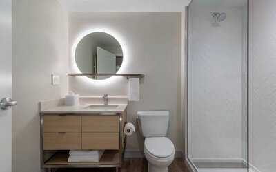 Guest bathroom with shower at TownePlace Suites Nashville Midtown.