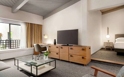 Day use room with TV and lounge area at Hilton Scottsdale Resort & Villas.