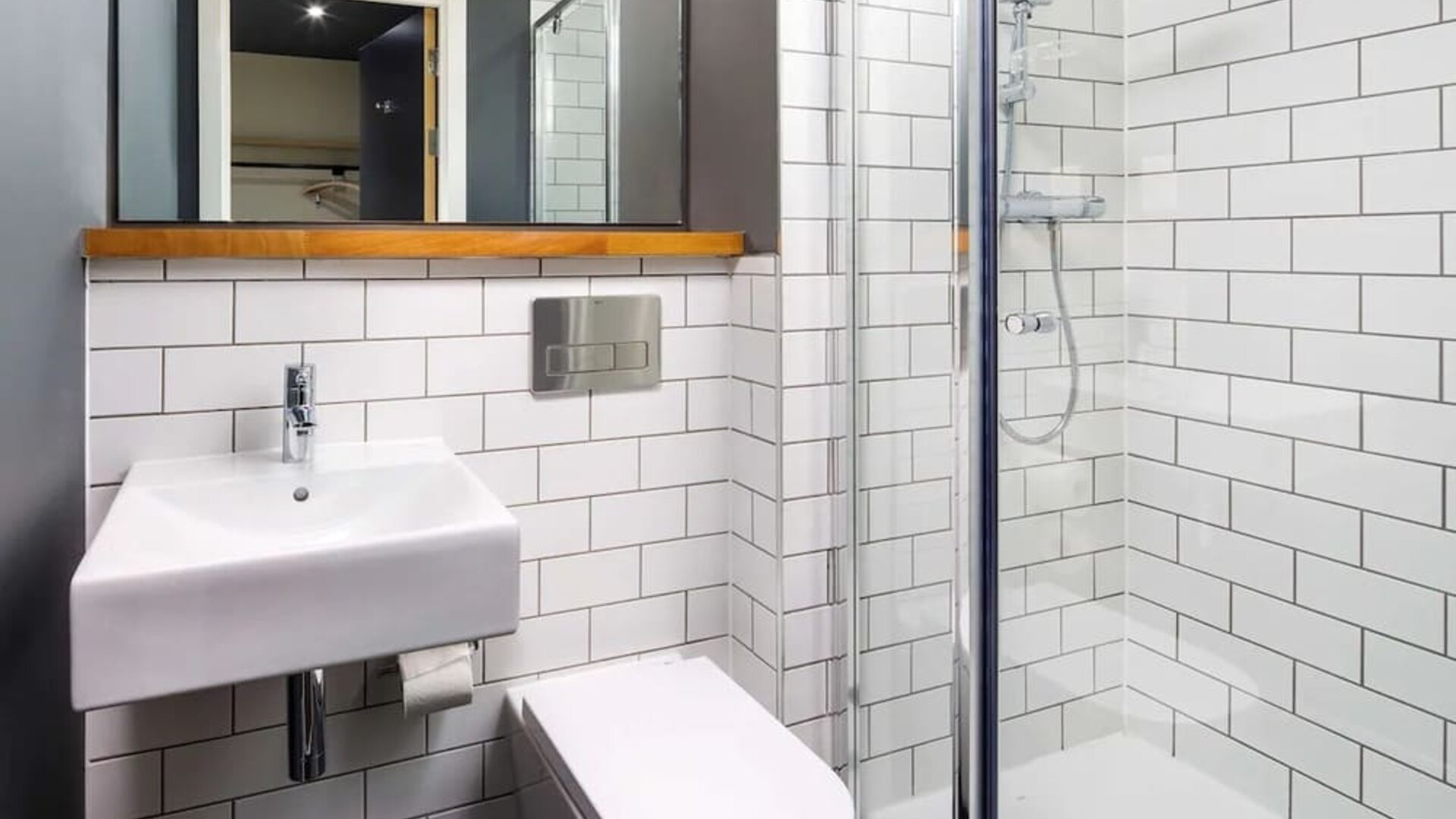 Guest bathroom with shower at Ibis Budget Sheffield Centre St Marys Gate.