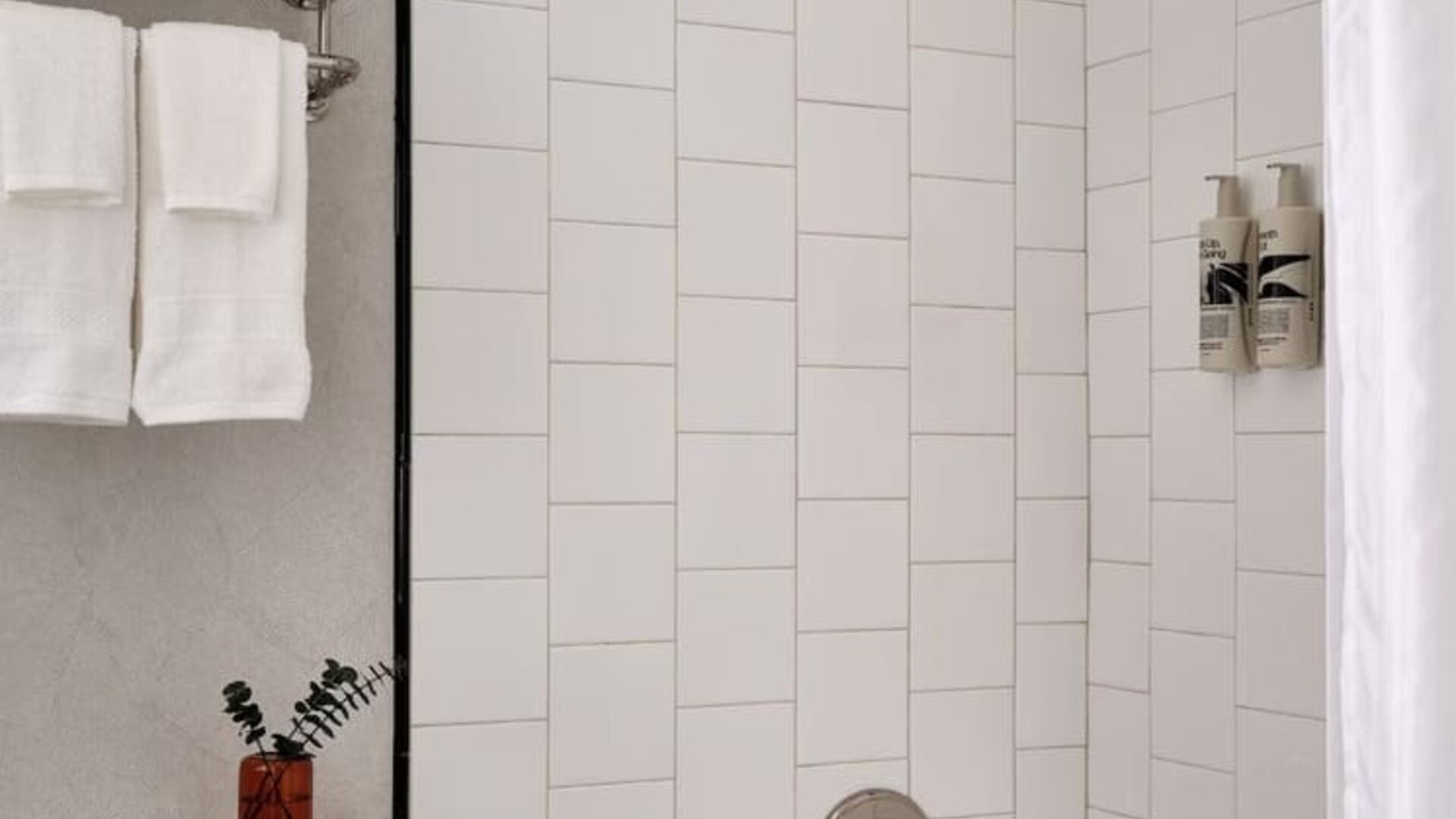 Private guest bathroom with shower at Romer Hell's Kitchen.