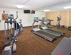 Fitness center at Norwood Inn Statefare Grounds.