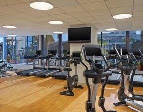 Fully equipped fitness center at Hotel Tampa Riverwalk.