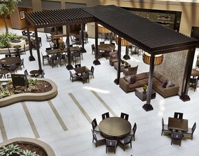 Dining area perfect for coworking at Embassy Suites By Hilton, Crystal City National Airport.