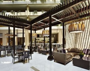 Dining area perfect for coworking at Embassy Suites By Hilton, Crystal City National Airport.