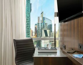 Day use room's workspace at Hilton Garden Inn New York/Times Square Central.