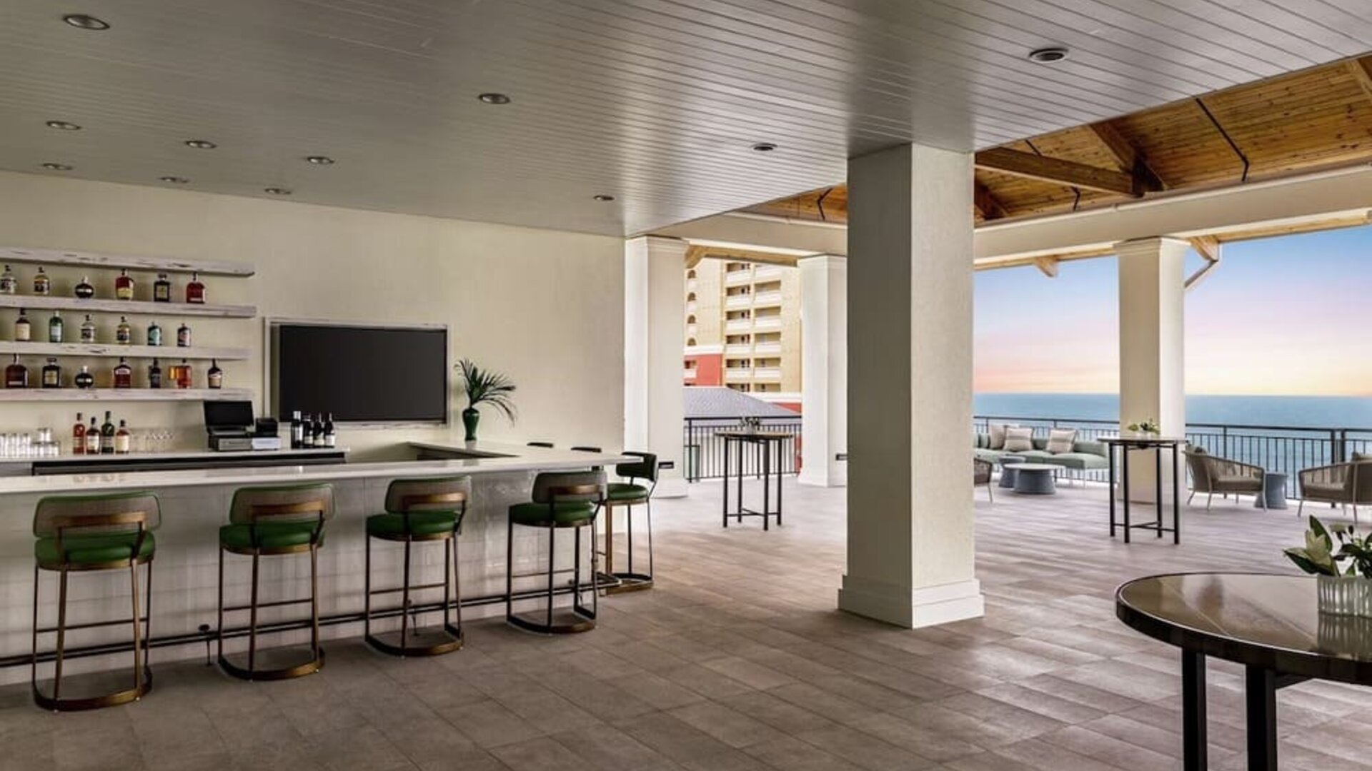 Hotel bar and lounge area at Embassy Suites By Hilton Panama City Beach Resort.
