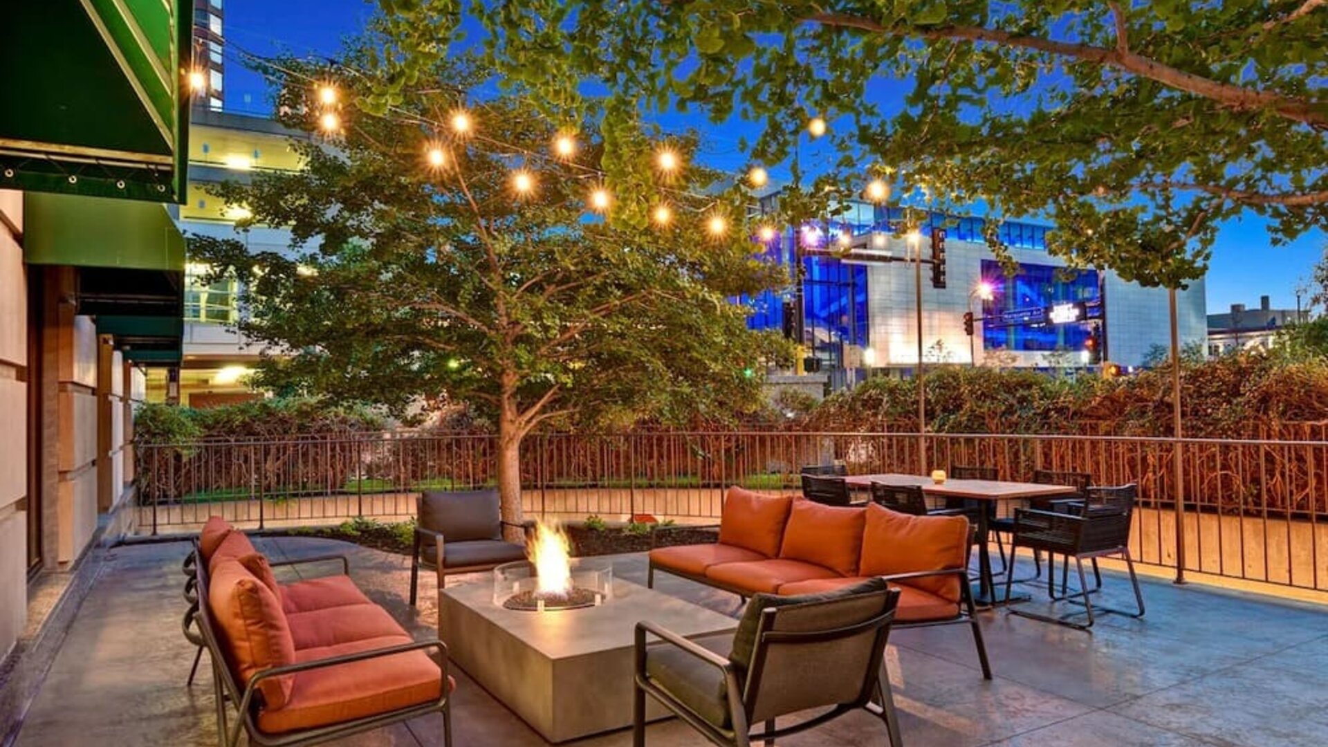 Hotel terrace with lounge seating and fire pit at Hilton Minneapolis.