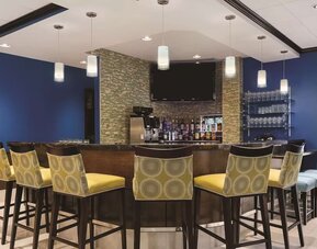 Hotel bar with lounge seating at Hilton Garden Inn Houston NW/Willowbrook.