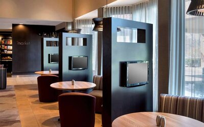 Sonesta Select Boston Milford’s media pods are cozy nooks with comfy seating, televisions, and coffee tables.