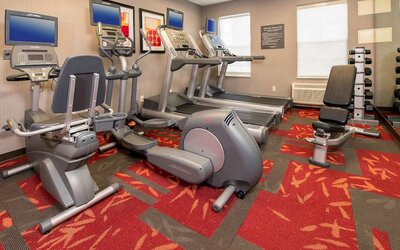Sonesta ES Suites Charlottesville University’s fitness center is equipped with a range of exercise machines, in addition to free weights and a bench.