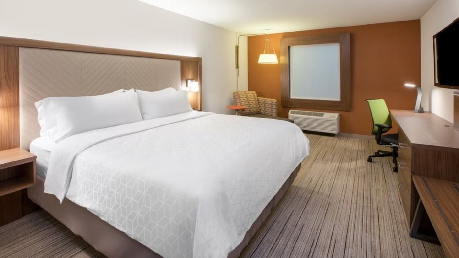 King bed with private bathroom at Holiday Inn Express & Suites Yorkville.
