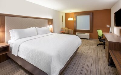King bed with private bathroom at Holiday Inn Express & Suites Yorkville.