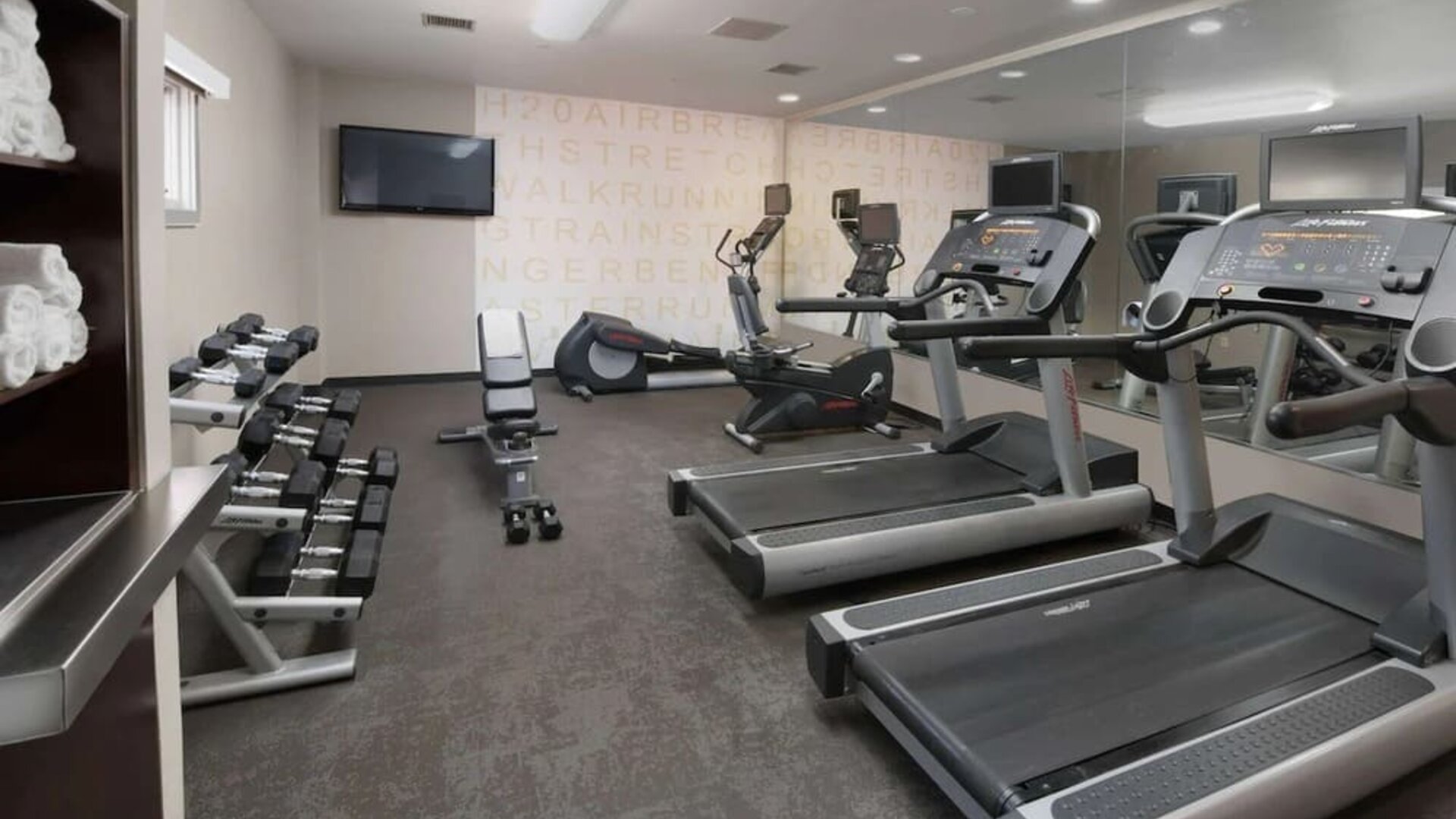 Fitness center available at Sonesta ES Suites Albuquerque.