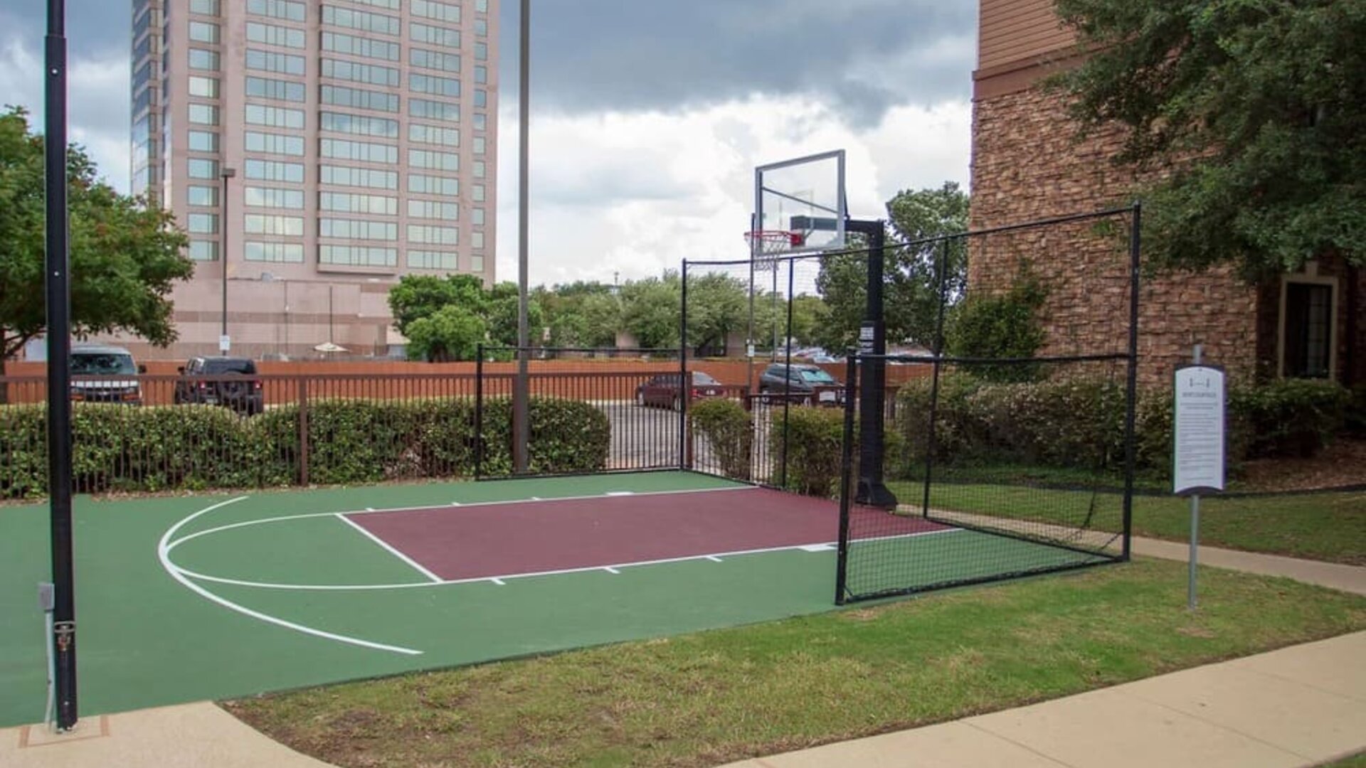 The hotel’s basketball court provides the chance to stay fit in the fresh air and is separated from the car park with fencing.