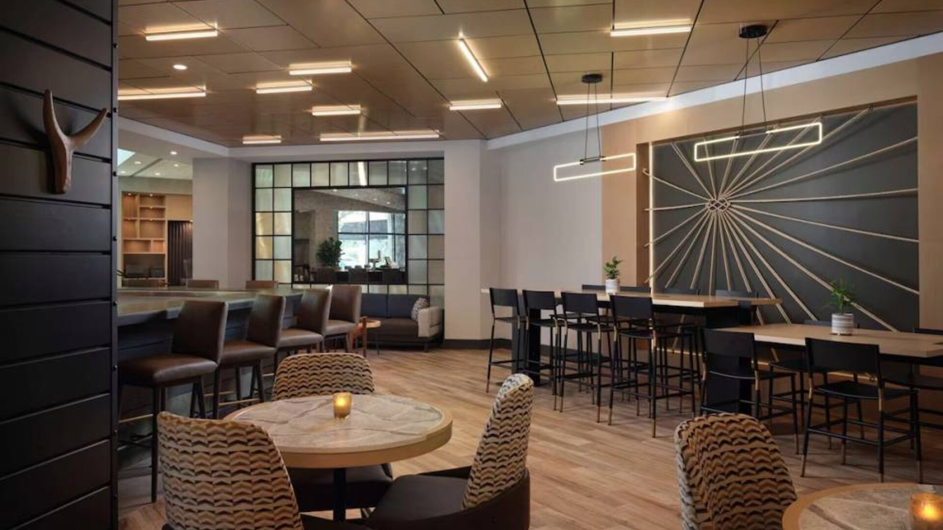 Haven Point Provisions & Spirits is the hotel restaurant and bar and serves up on-site dining, with a mix of regular and tall stool seating, and a hard floor.