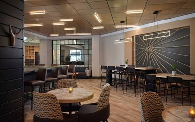 Haven Point Provisions & Spirits is the hotel restaurant and bar and serves up on-site dining, with a mix of regular and tall stool seating, and a hard floor.