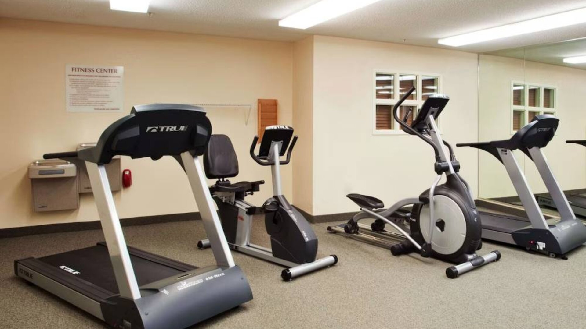 The fitness center at Sonesta Simply Suites Atlanta Gwinnett Place has various exercise machines, including treadmills, an elliptical, and a bike.