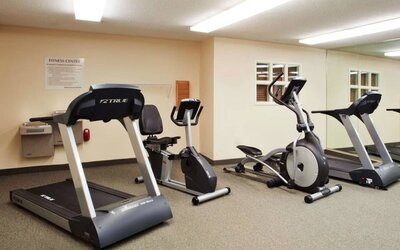 The fitness center at Sonesta Simply Suites Atlanta Gwinnett Place has various exercise machines, including treadmills, an elliptical, and a bike.