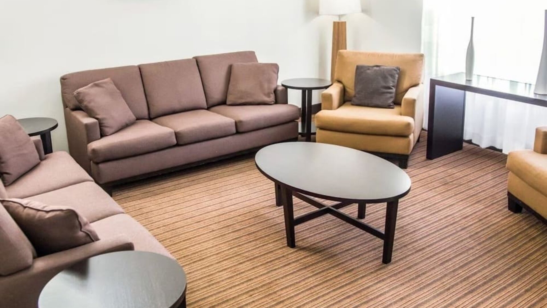 Lobby and lounge ideal for coworking at Sleep Inn Tinley Park.
