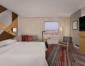 King room with TV at Sheraton Amsterdam Airport Hotel And Conference Center.