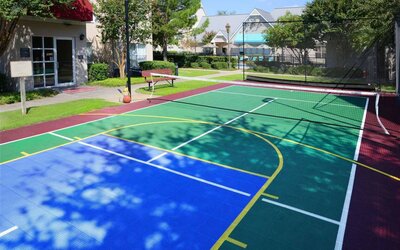 The hotel’s sports court is suitable for multiple activities including basketball and tennis, and has a bench for spectators.