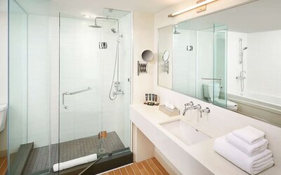 Guest bathroom with showerr at Novotel Toronto Vaughan Centre.
