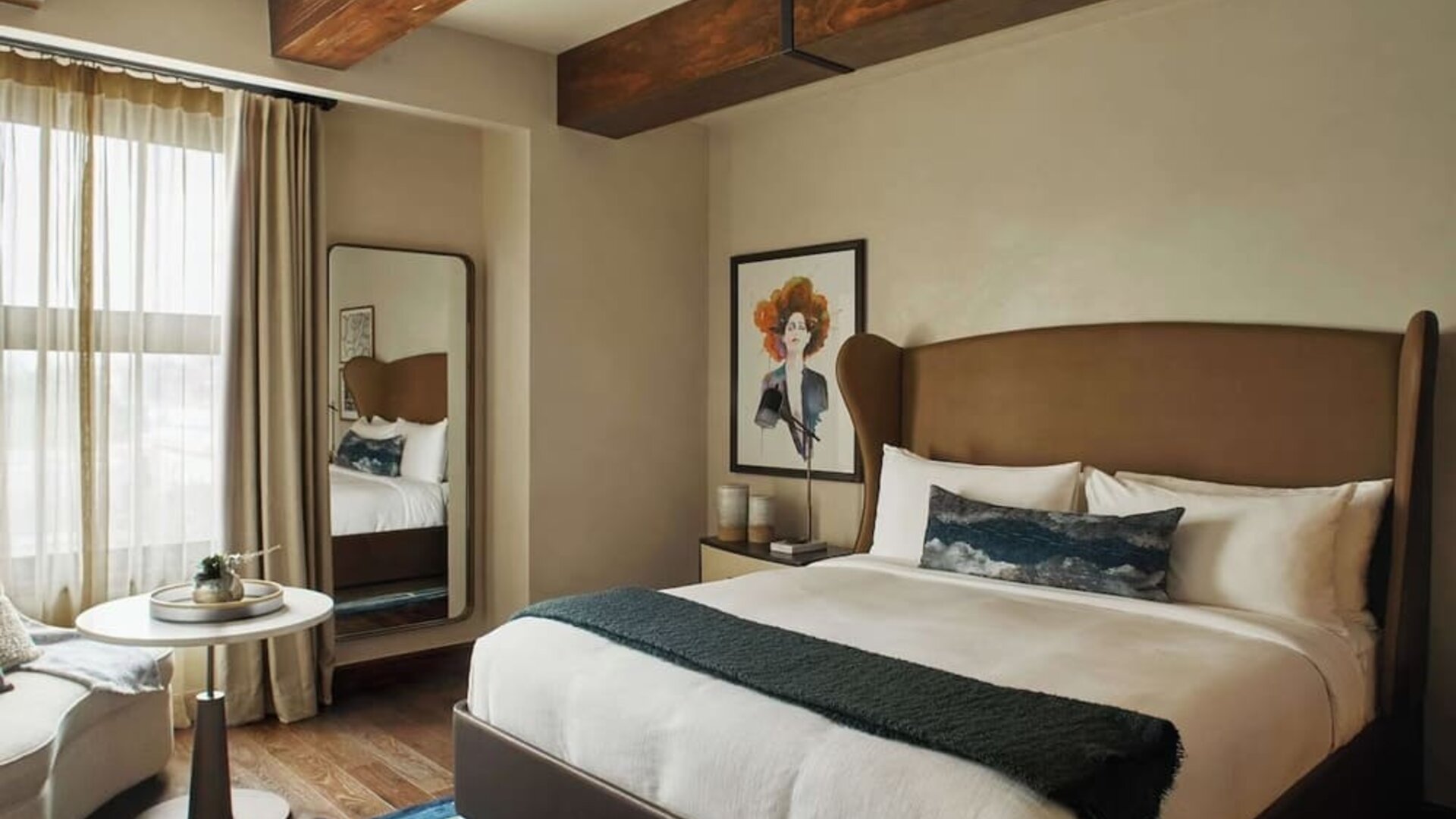 Delux king room with natural light at Hotel Figueroa.