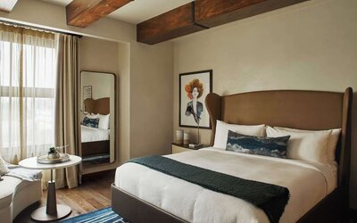 Delux king room with natural light at Hotel Figueroa.