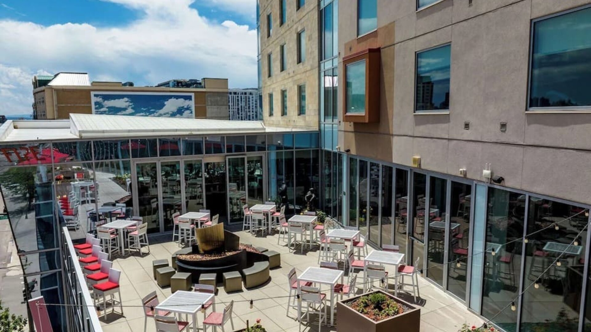 Stunning outdoor lounge and dining space at The Art Hotel Denver.