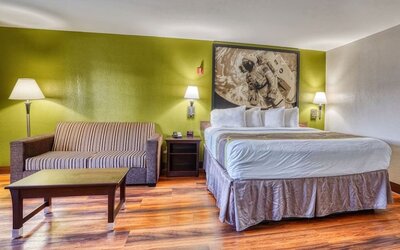 Day use room with lounge area at Super 8 By Wyndham Houston/Webster.