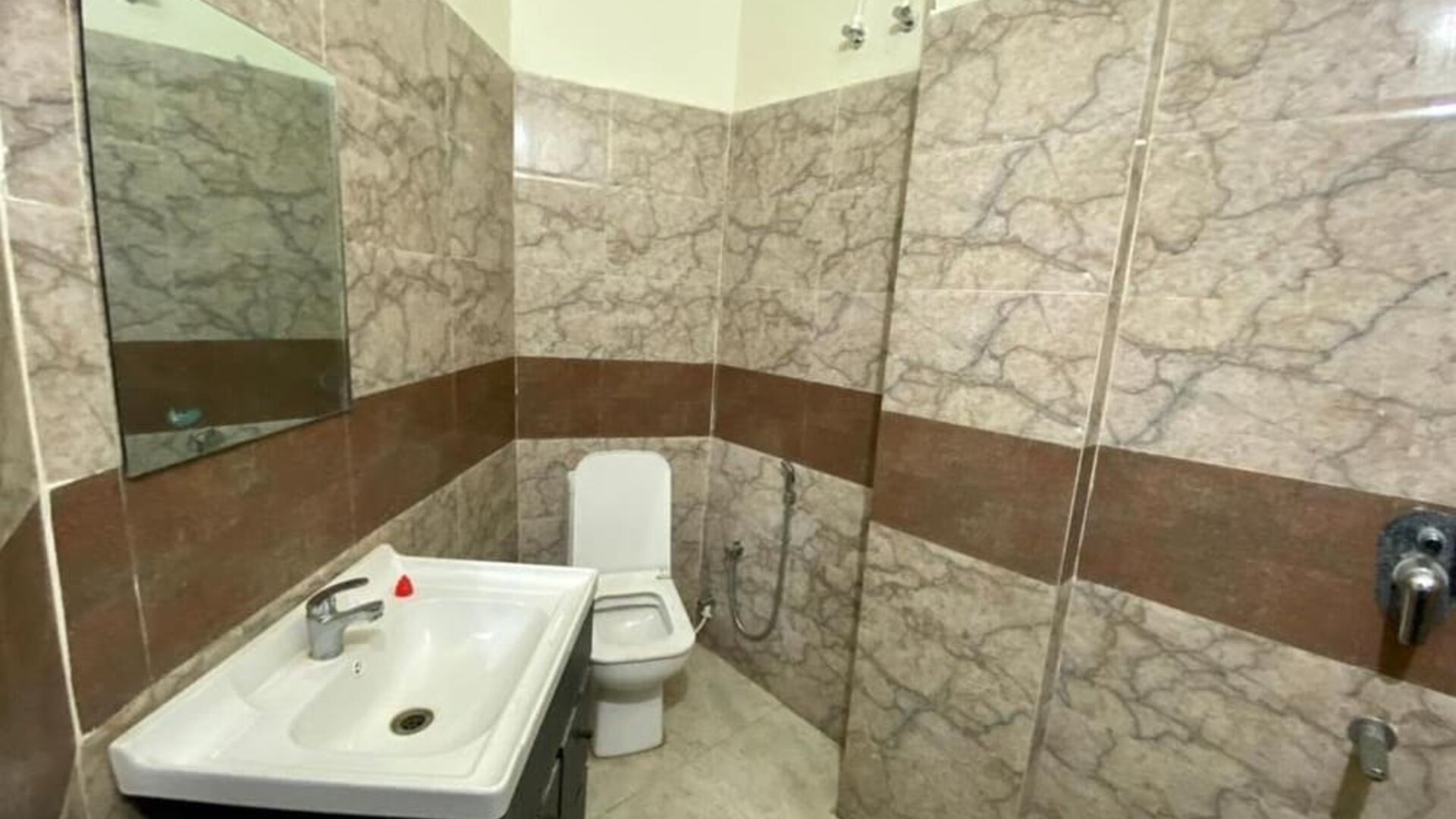 Guest bathroom with shower at Pradhan Stay Sohna Near Bus Stand.