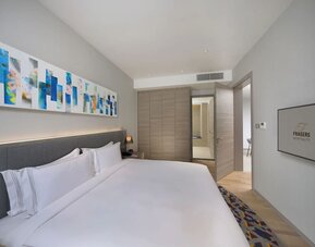 Standard king room with TV and private bathroom at Capri By Fraser Johor Bahru.