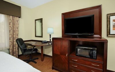 Day use room with TV and work area at Hampton Inn & Suites Conroe - I-45 North.