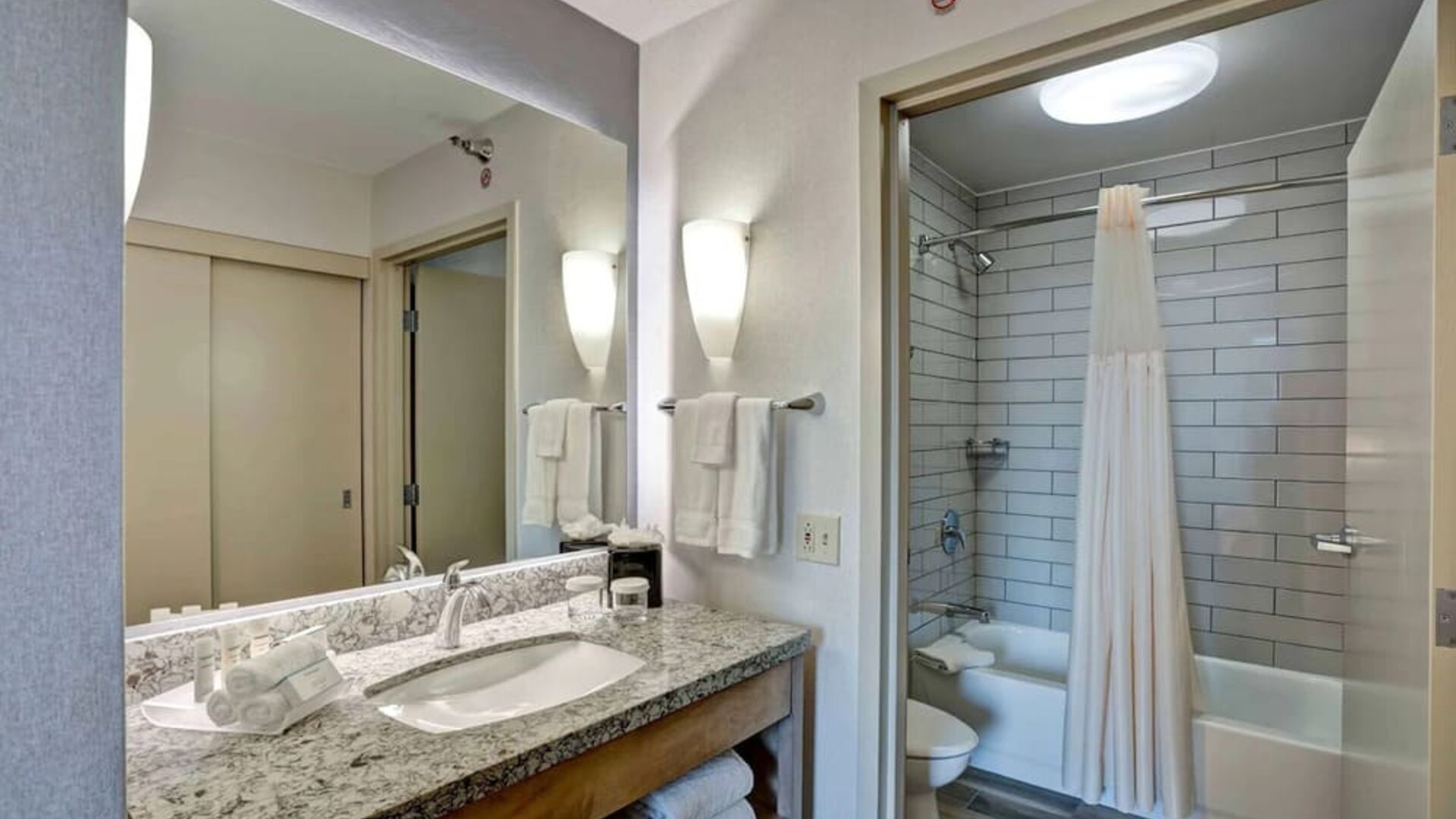 Private bathroom at Homewood Suites By Hilton Chicago-Downtown.