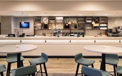 Bar and lounge area at Hampton By Hilton London Stansted Airport.