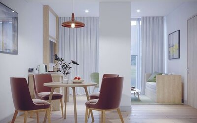 Spacious king room with lounge area at Hilton Garden Inn Tbilisi Riverview.