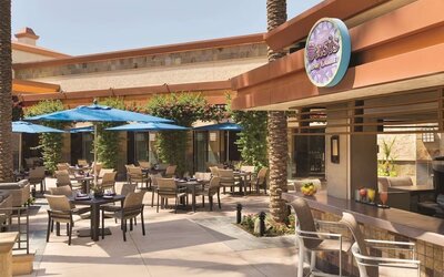 Sunny outdoor terrace at Hilton Scottsdale Resort & Villas.