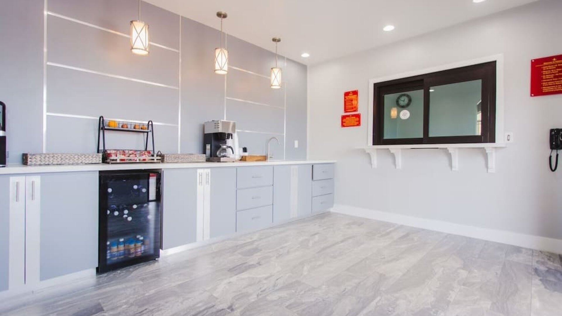 Kitchen and dining area at Palace Inn I-10 West & Beltway 8.
