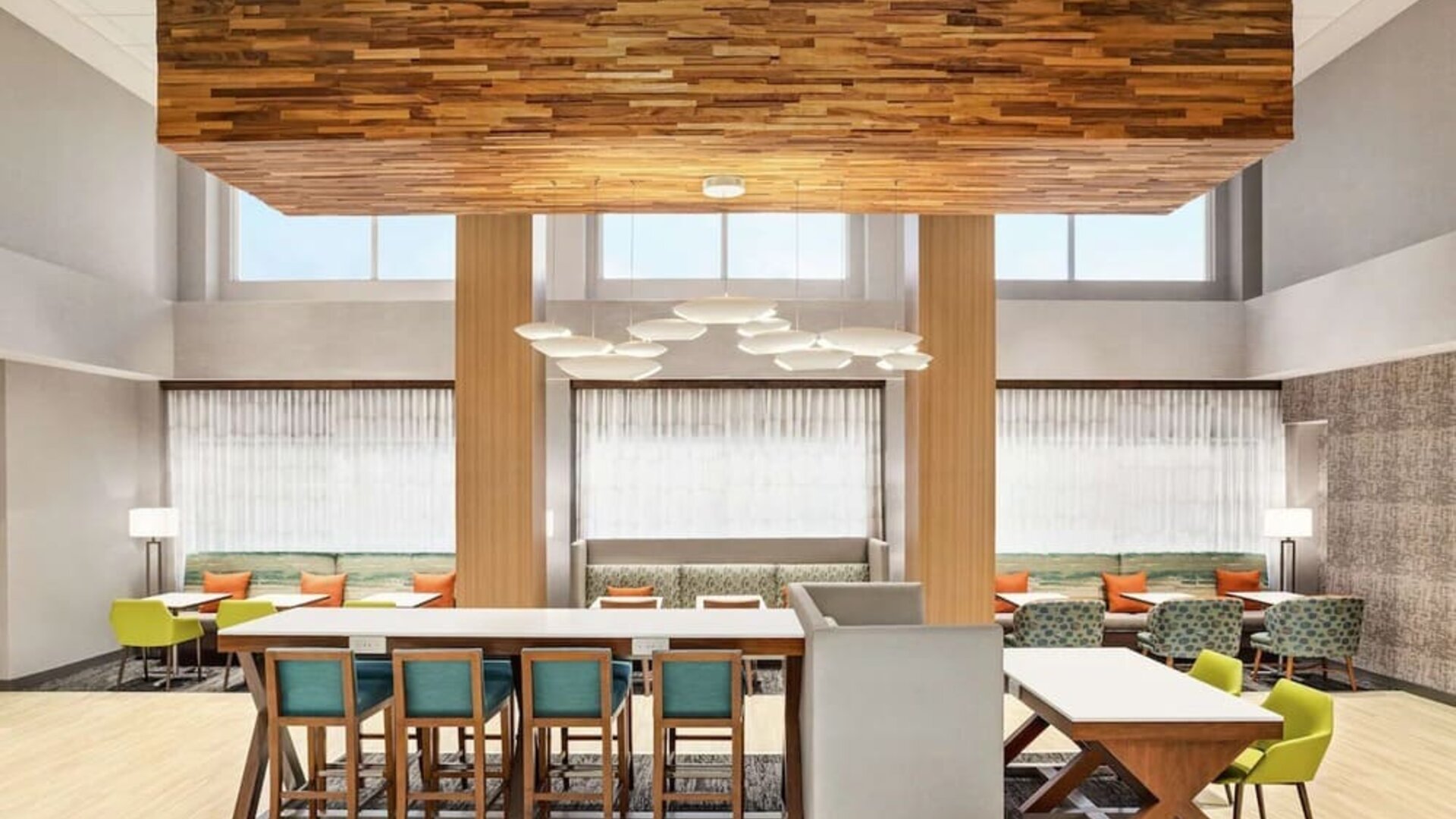 Meeting space and coworking area at Hampton Inn & Suites Miami Kendall. 